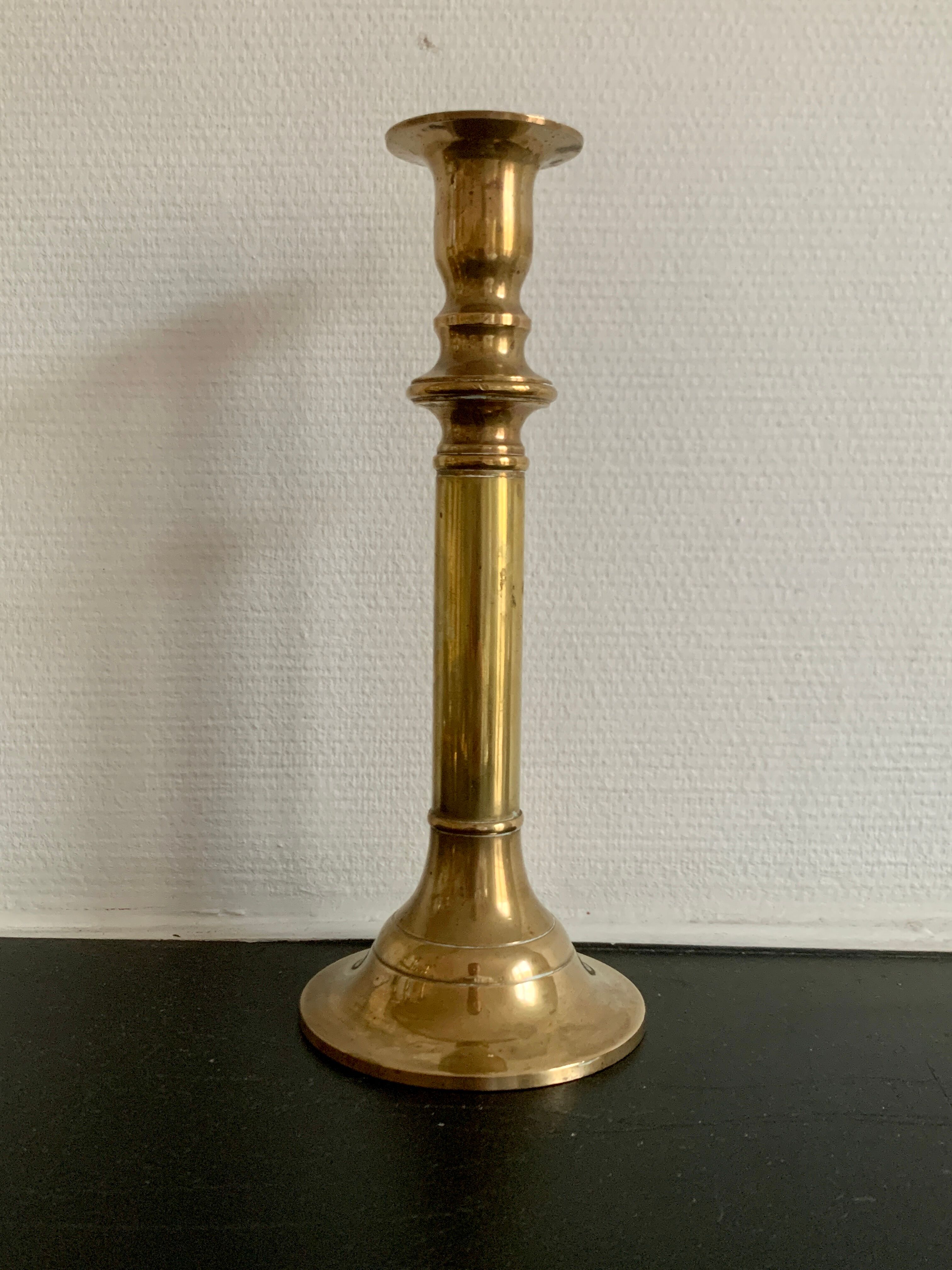 Set of 9 vintage brass candlesticks