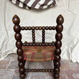Turned wooden chair by Charles Dudouyt