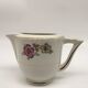 Coffee service 6 cups with saucers, sugar bowl and creamer.