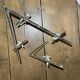 Pair of asymmetrical Hollywood Regency sconces, bronze - opaline glass, 70s
