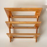 Wall-mounted magazine rack in varnished plywood, 80s/90s