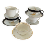 5 tasses à café en blanc , doré et noir