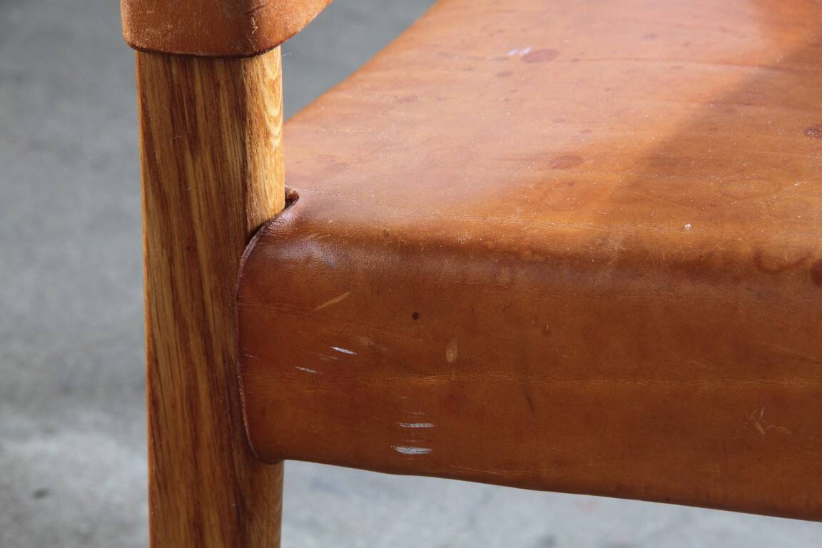 Pair of vintage Per-Olof Scotte "Premier 69" oak armchairs in cognac leather