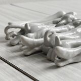 Porcelain animal knife holder.