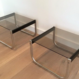 Paire de bouts de canapé en chrome, bois noirci et verre