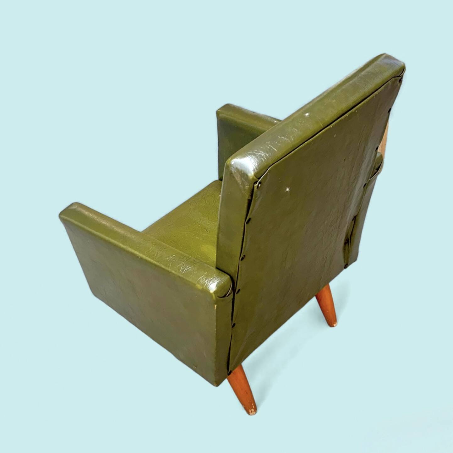 Vintage children's armchair in green skai