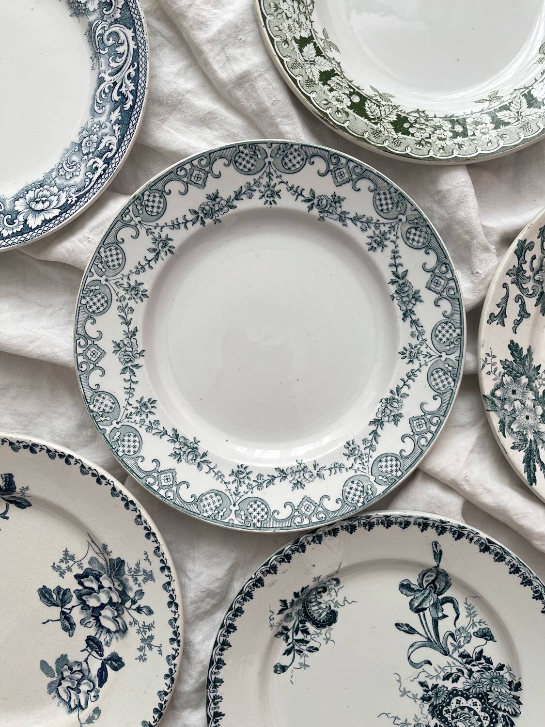 6 mismatched Saint Amand ironware dessert plates