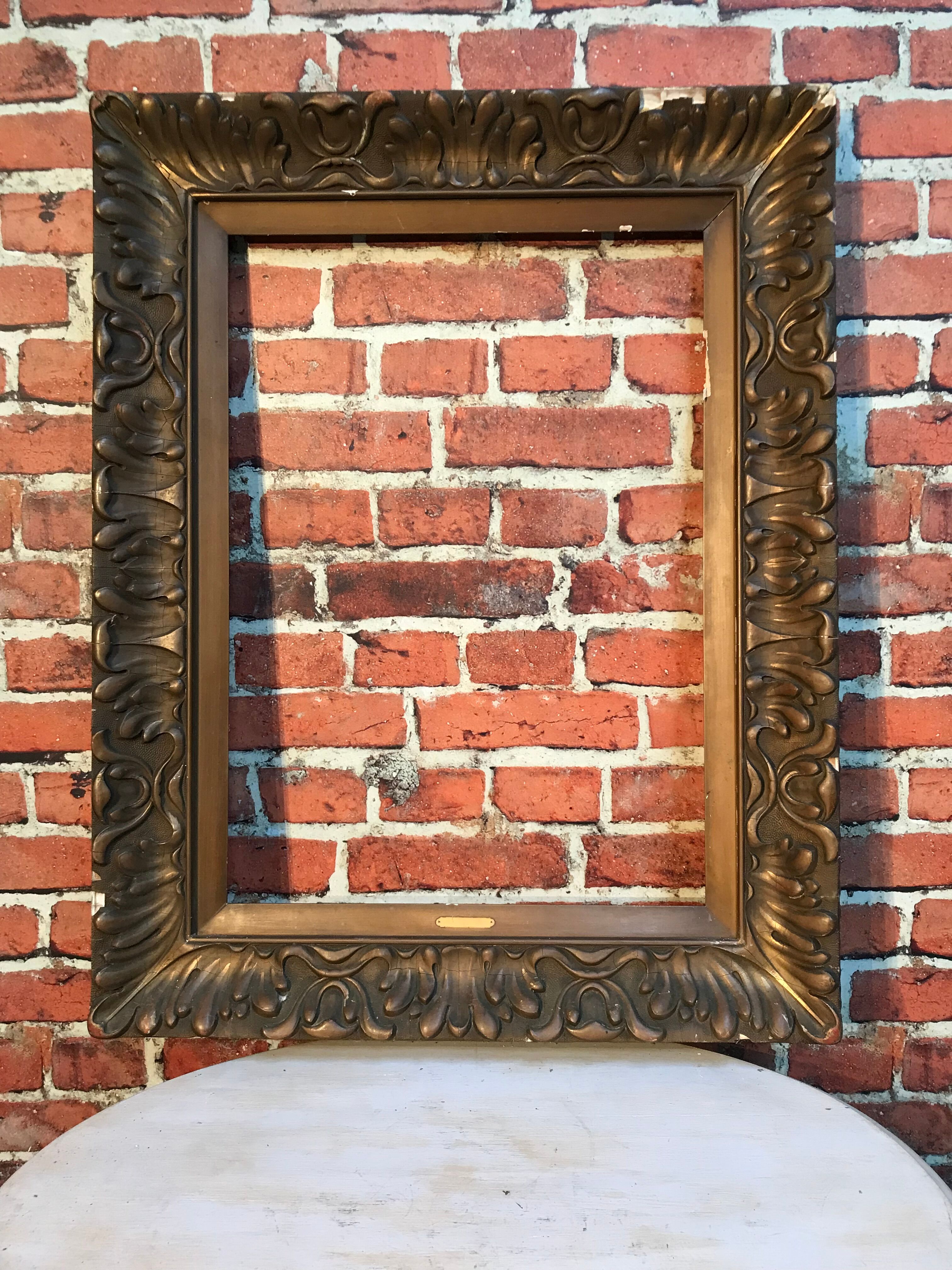 Wooden frame and stucco moldings