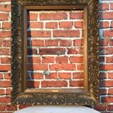 Wooden frame and stucco moldings