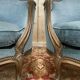 Paire de fauteuils bergères de style Louis XV en velours bleu et bois doré