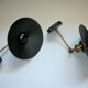 Pair of metal wall lamps in black and gold