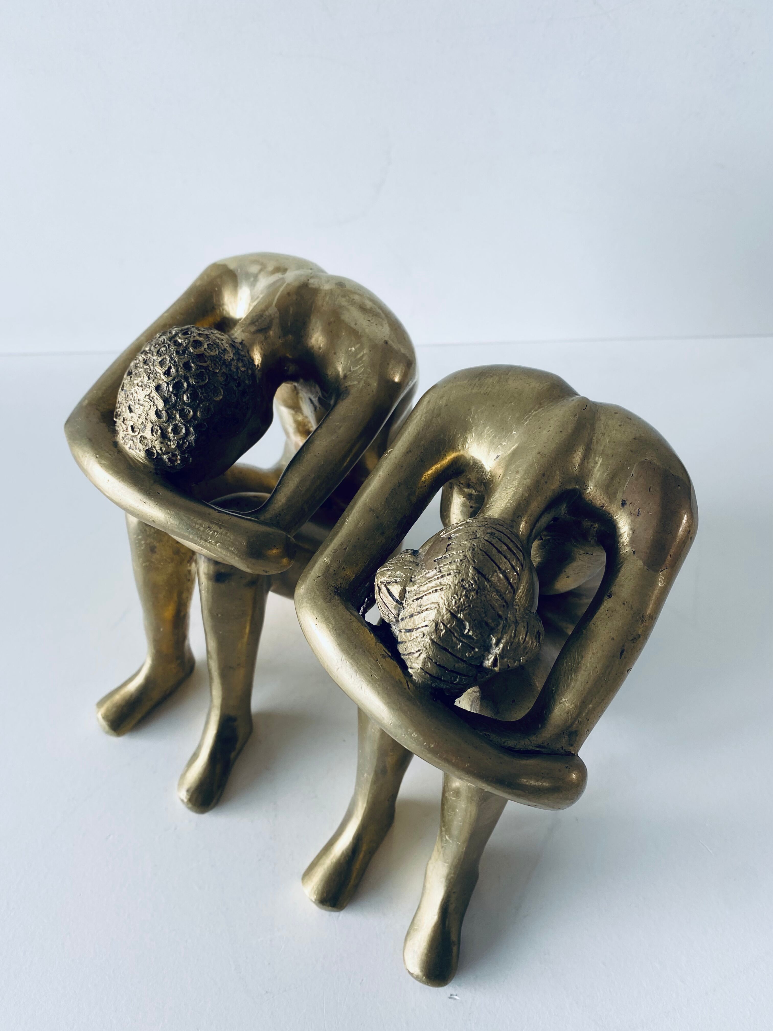 Couple carved in gilded bronze