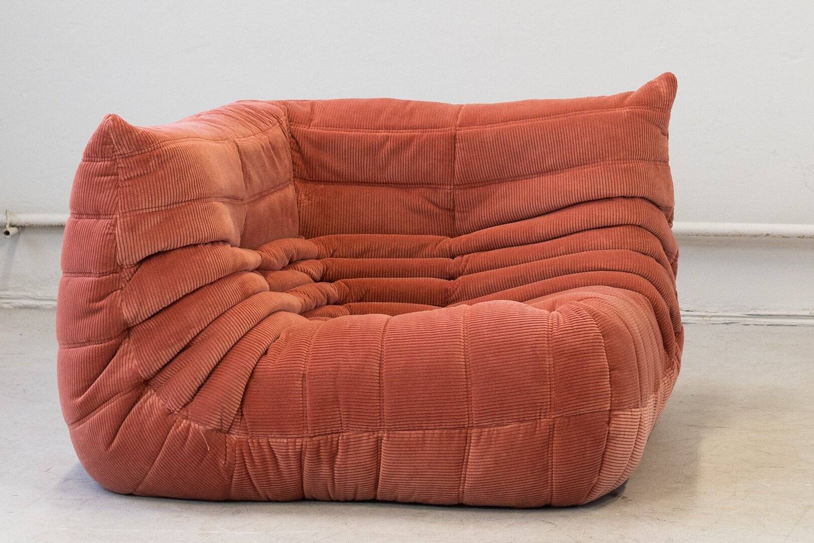 Coral corduroy Togo corner chair by Michel Ducaroy for Ligne Roset