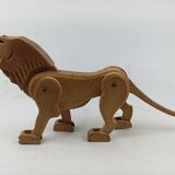Articulated wooden lion