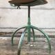 Former green metal workshop chair