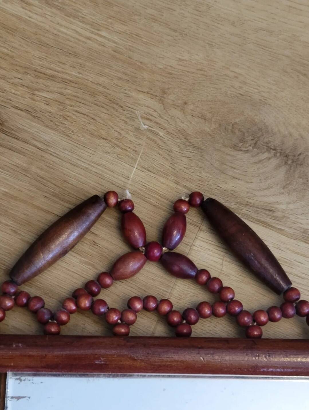 Miroir bohème vintage en perles de bois