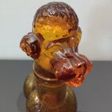 Flacon ancien en verre ambré "caniche"