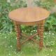 Side table with beaded legs