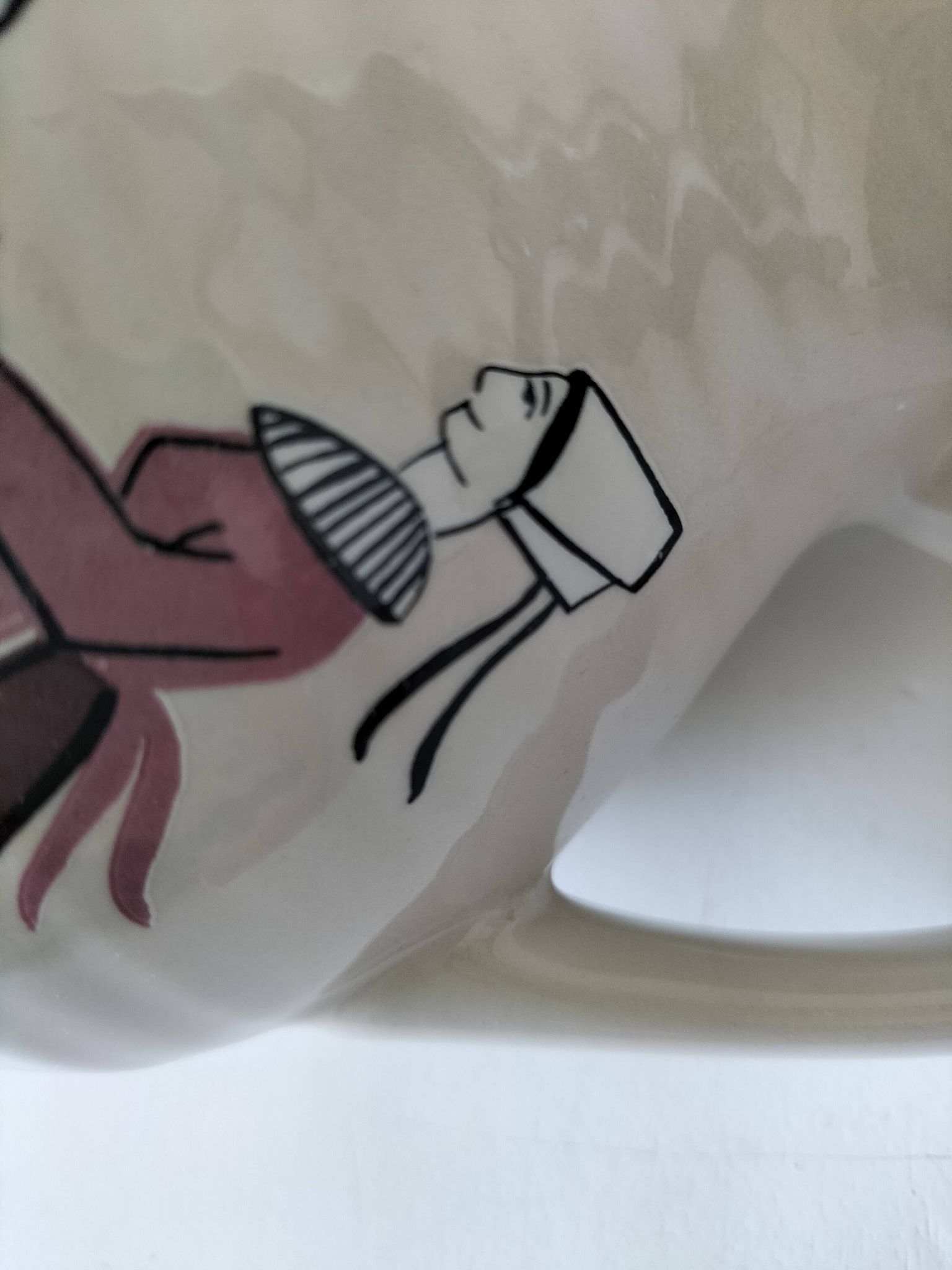 Ceramic pitcher from Quimper, created by Dominique Villard.