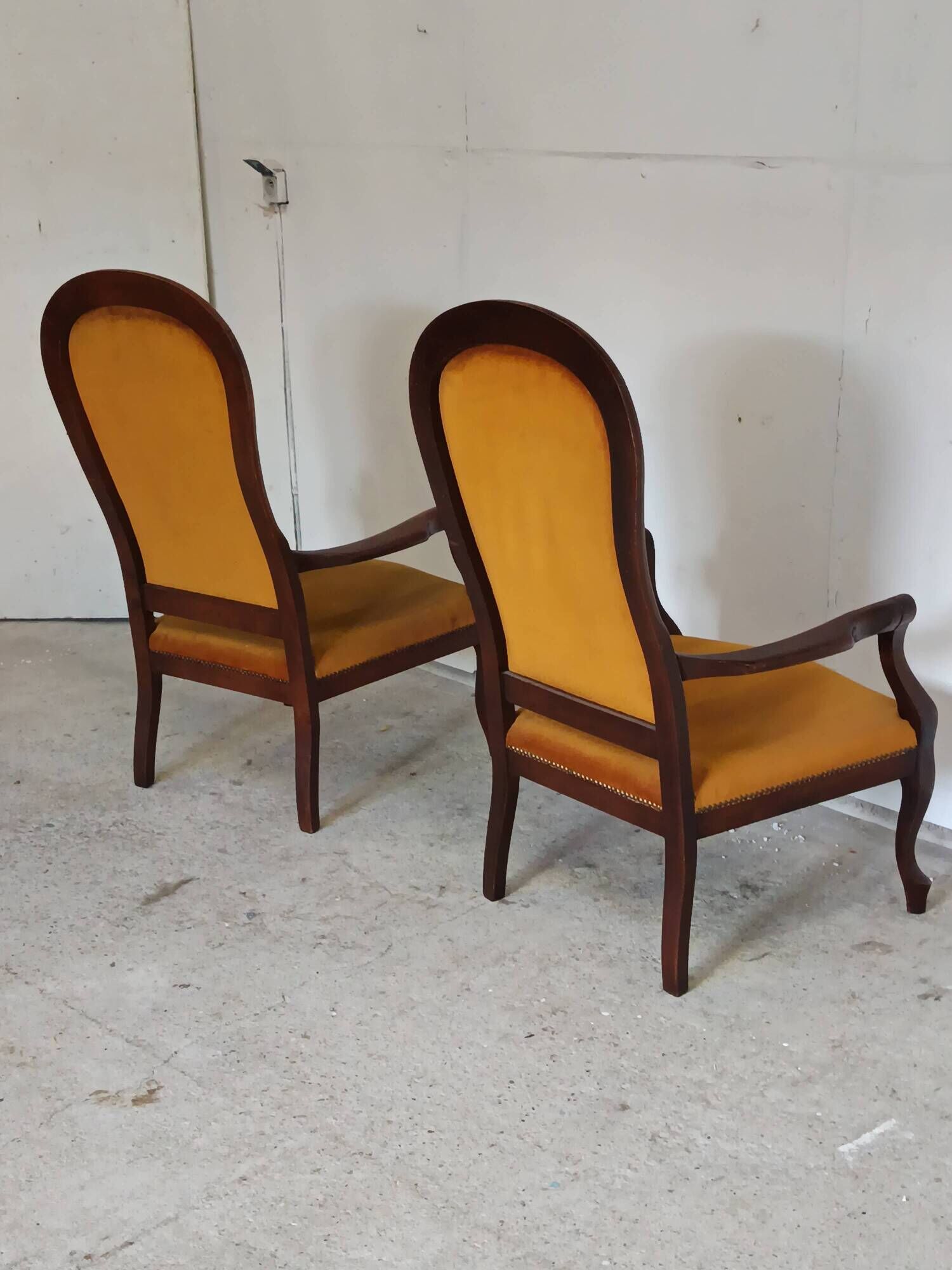 pair of Voltaire armchairs