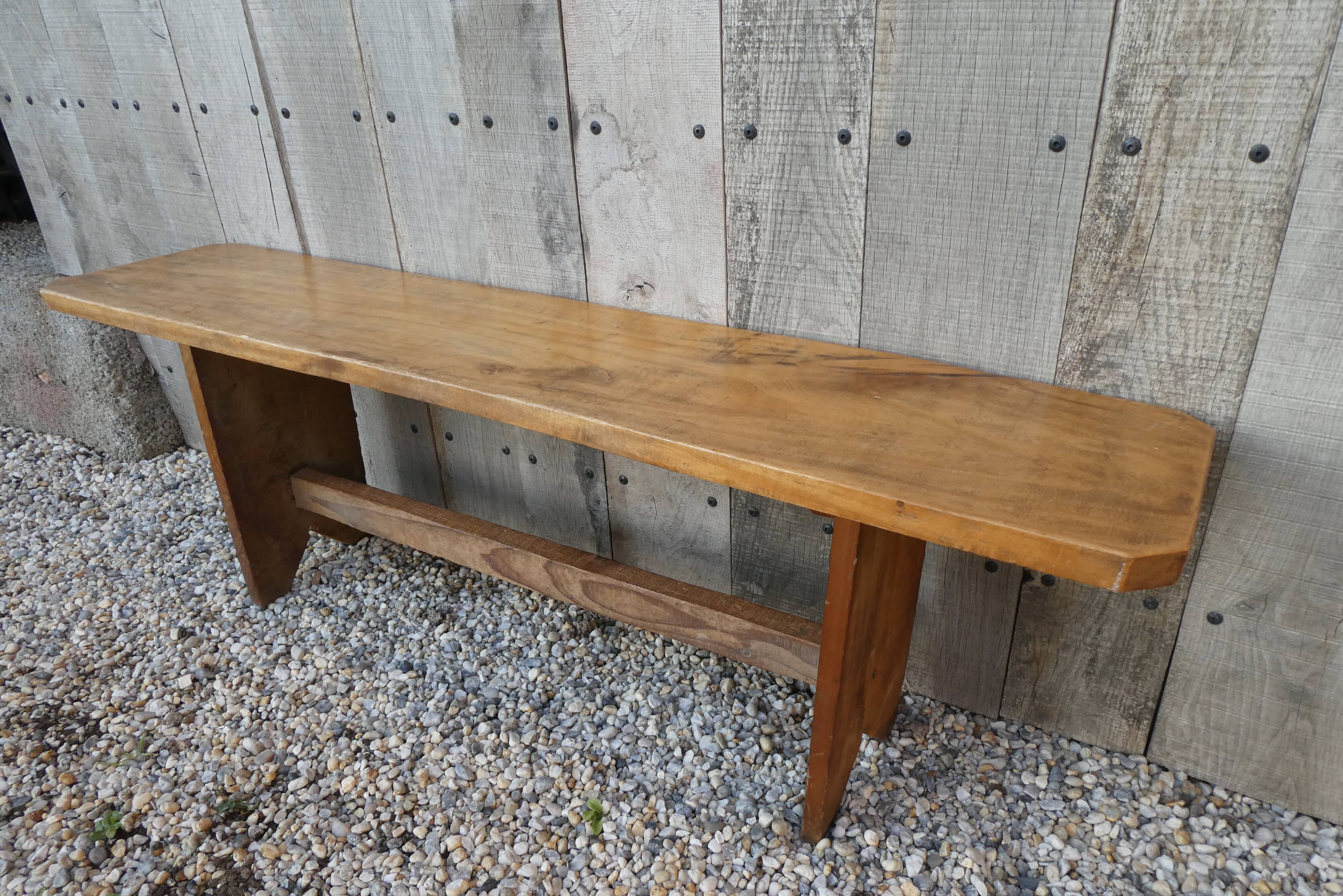 Wide solid wooden bench