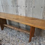 Wide solid wooden bench