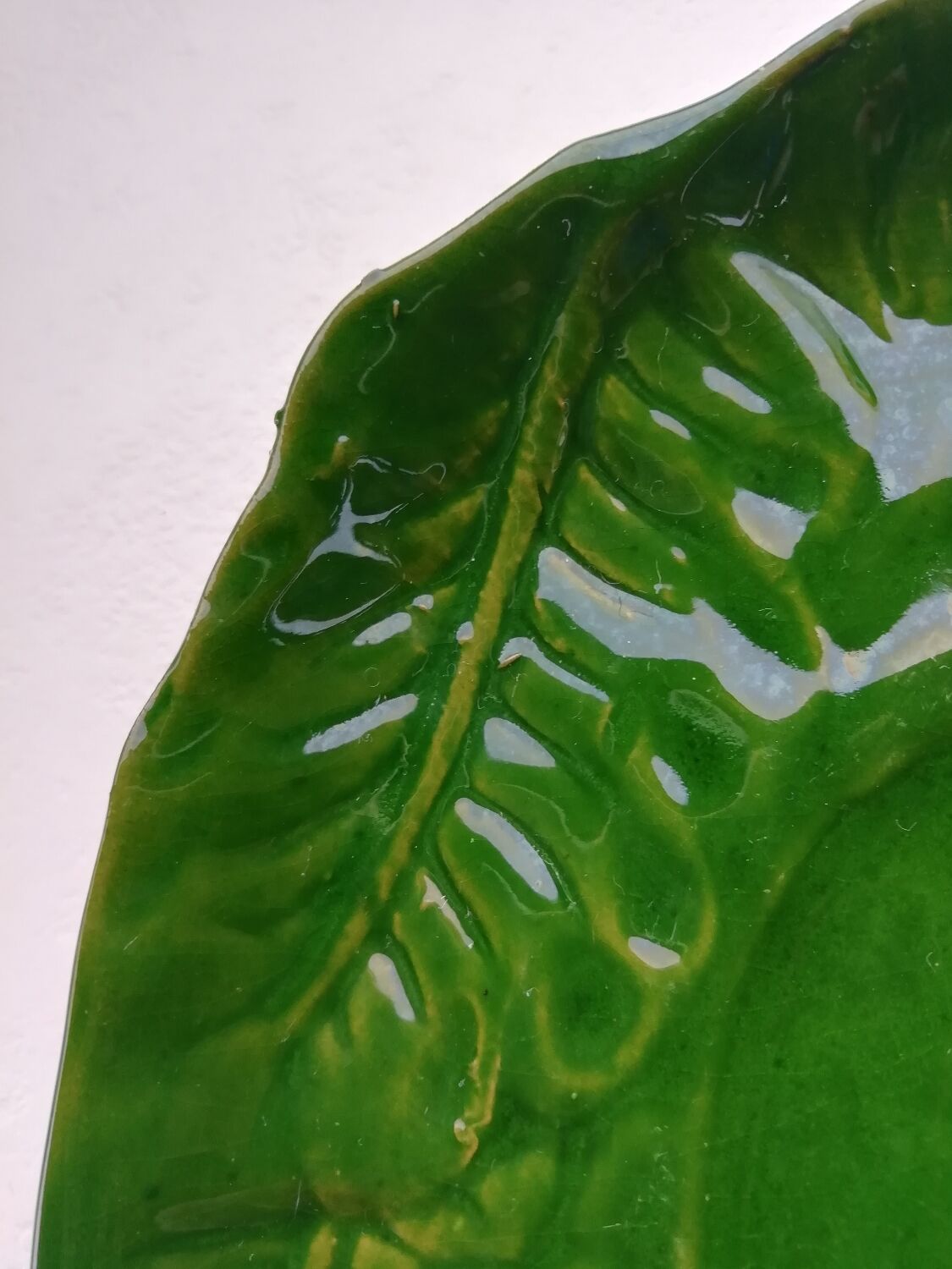 Oval flat decoration in relief