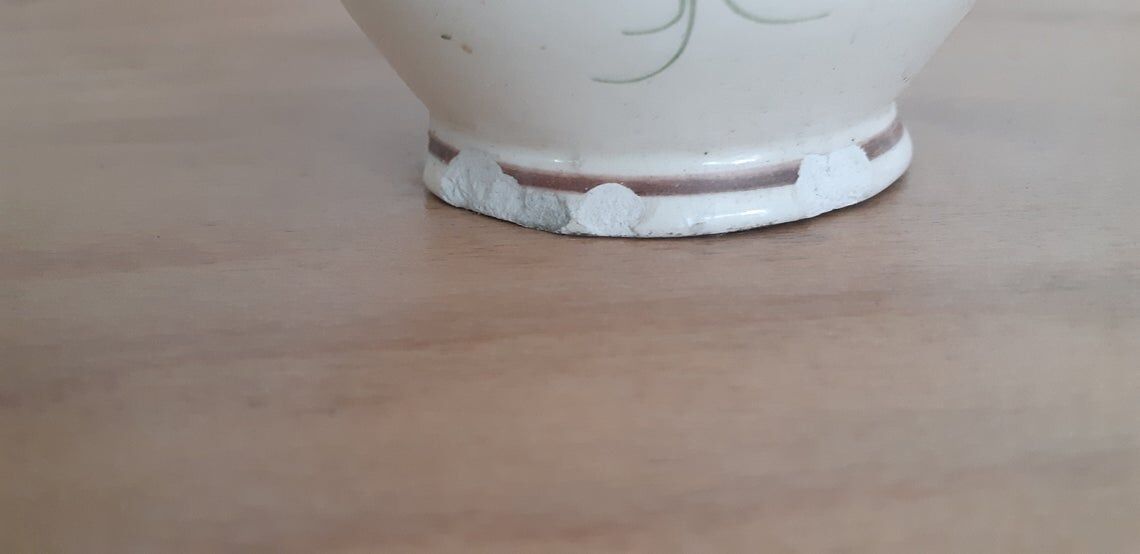 Pied de lampe en faience motif fleuri