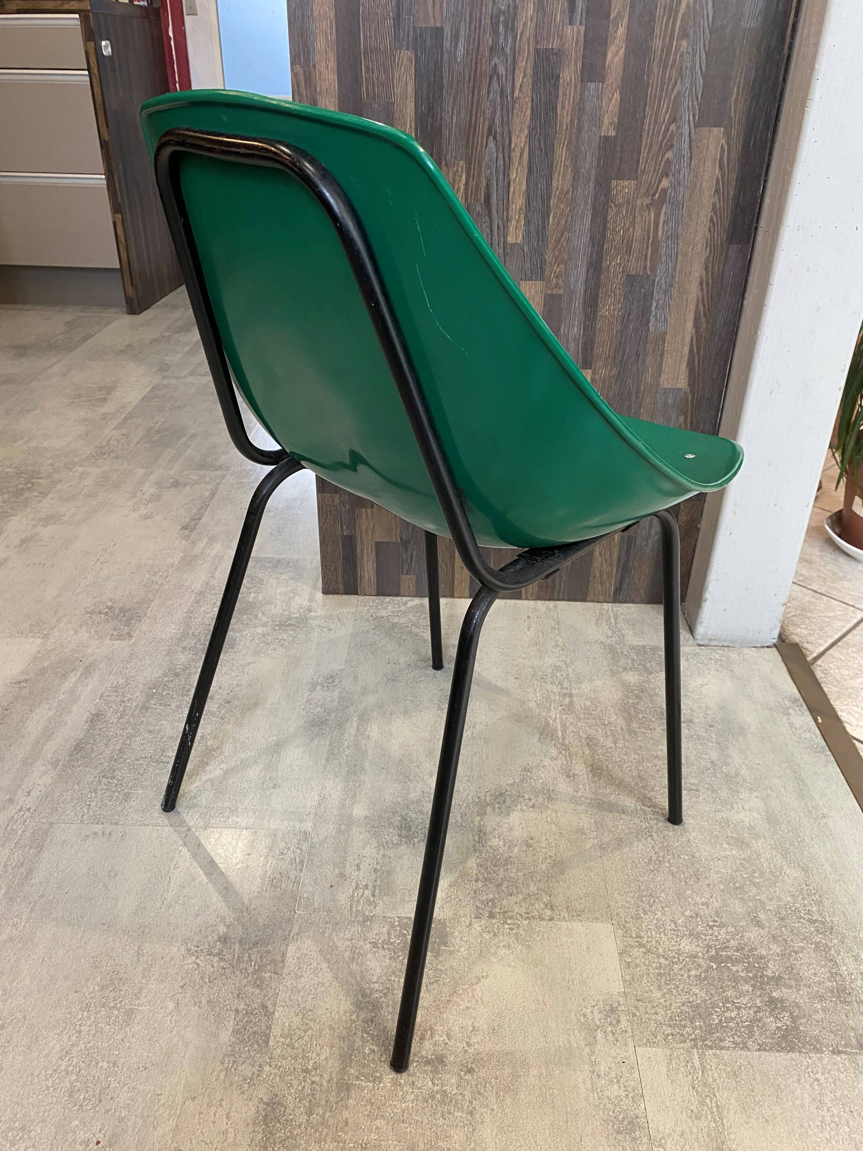 A shell chair by Pierre Guariche for Meurop in vintage green from the 1960s.
