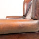 Dark brown vintage sheep leather wingback armchair