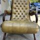 Victoria style green leather chesterfield armchair