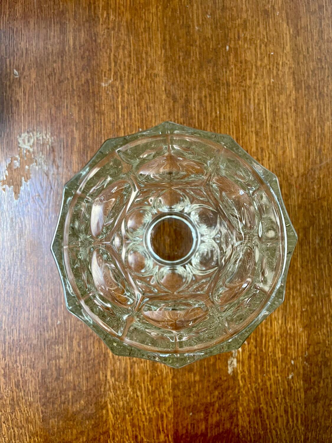 Molded glass vase with sculpted decoration