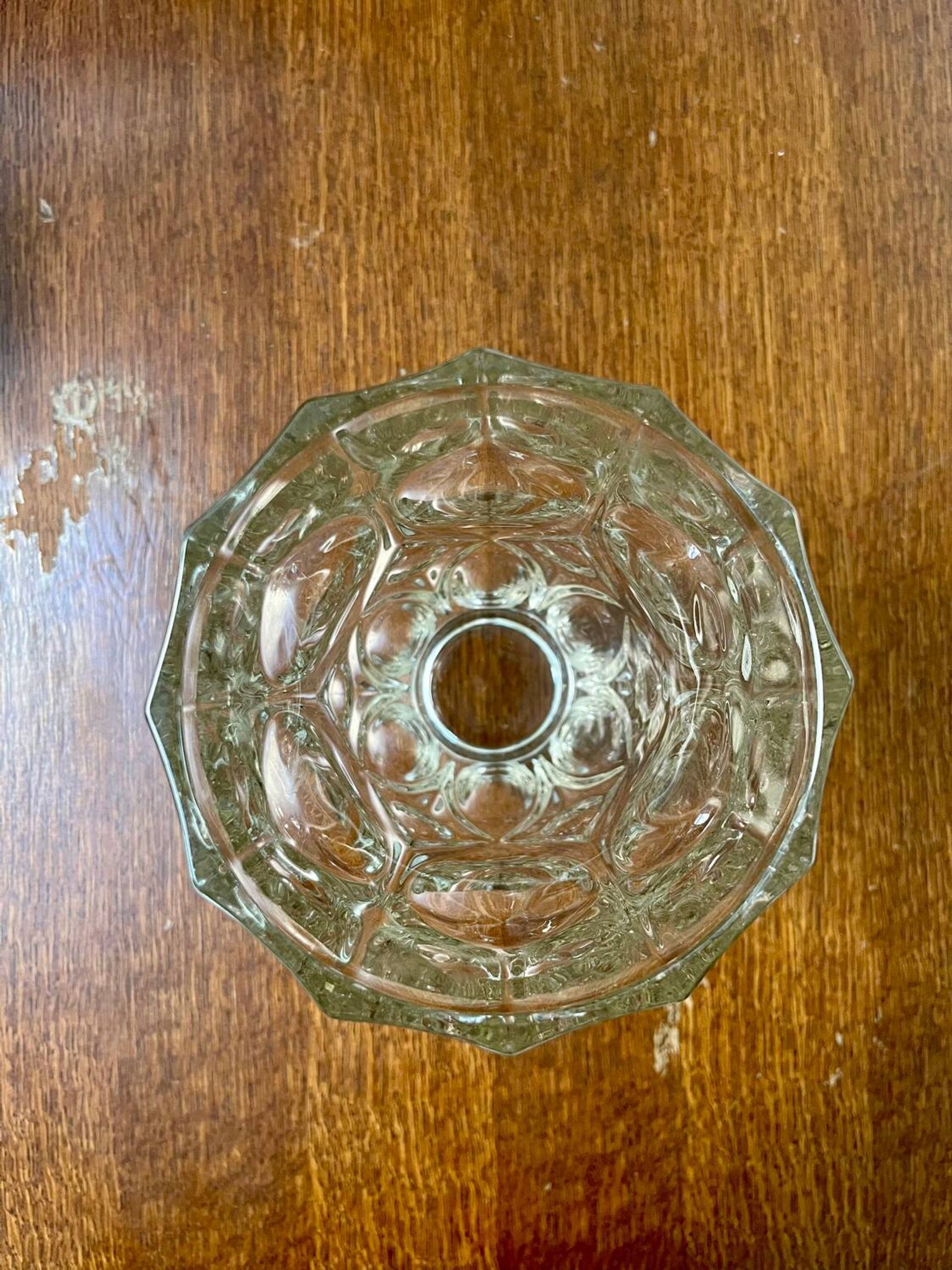 Molded glass vase with sculpted decoration