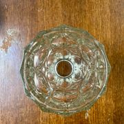 Molded glass vase with sculpted decoration