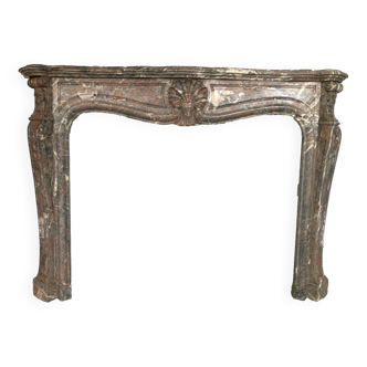 Cheminée de style Louis XV en marbre de breche rouge XIX siècle