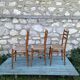 3 Scandinavian chairs seated in rope