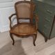 Cane armchair