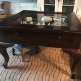 Coffee table with display drawer