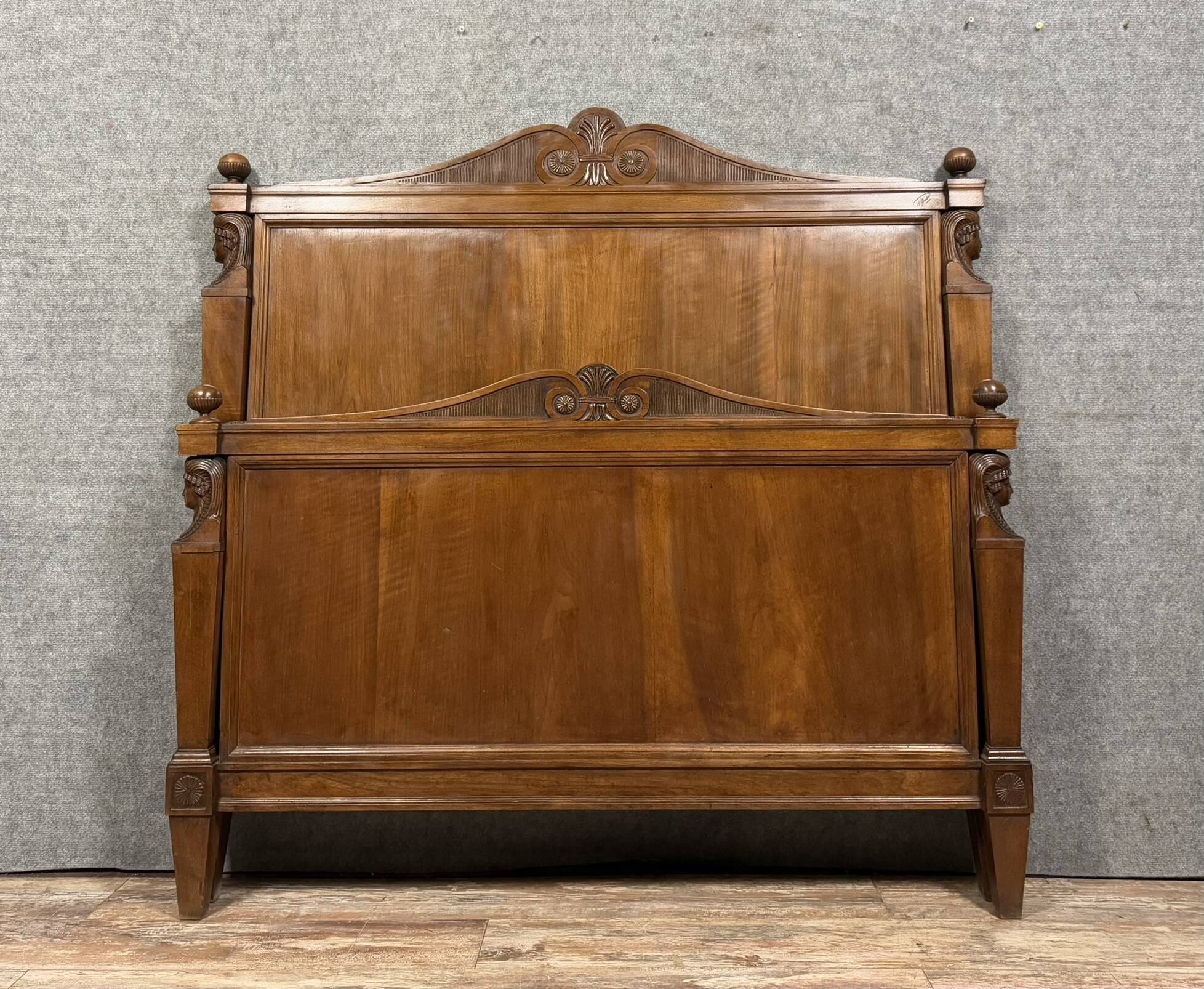 Bastel stamped bed from the Empire Consulate period in walnut circa 1800