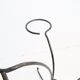 Arched steel flowered foot for balconies and terraces
