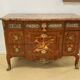 Transition chest of drawers with floral marquetry and music trophy