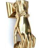 Brass hand-shaped door knocker, 1950s