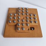 Solid wood and chrome steel solitaire game