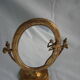 Rotating mirror in psychedelic brass