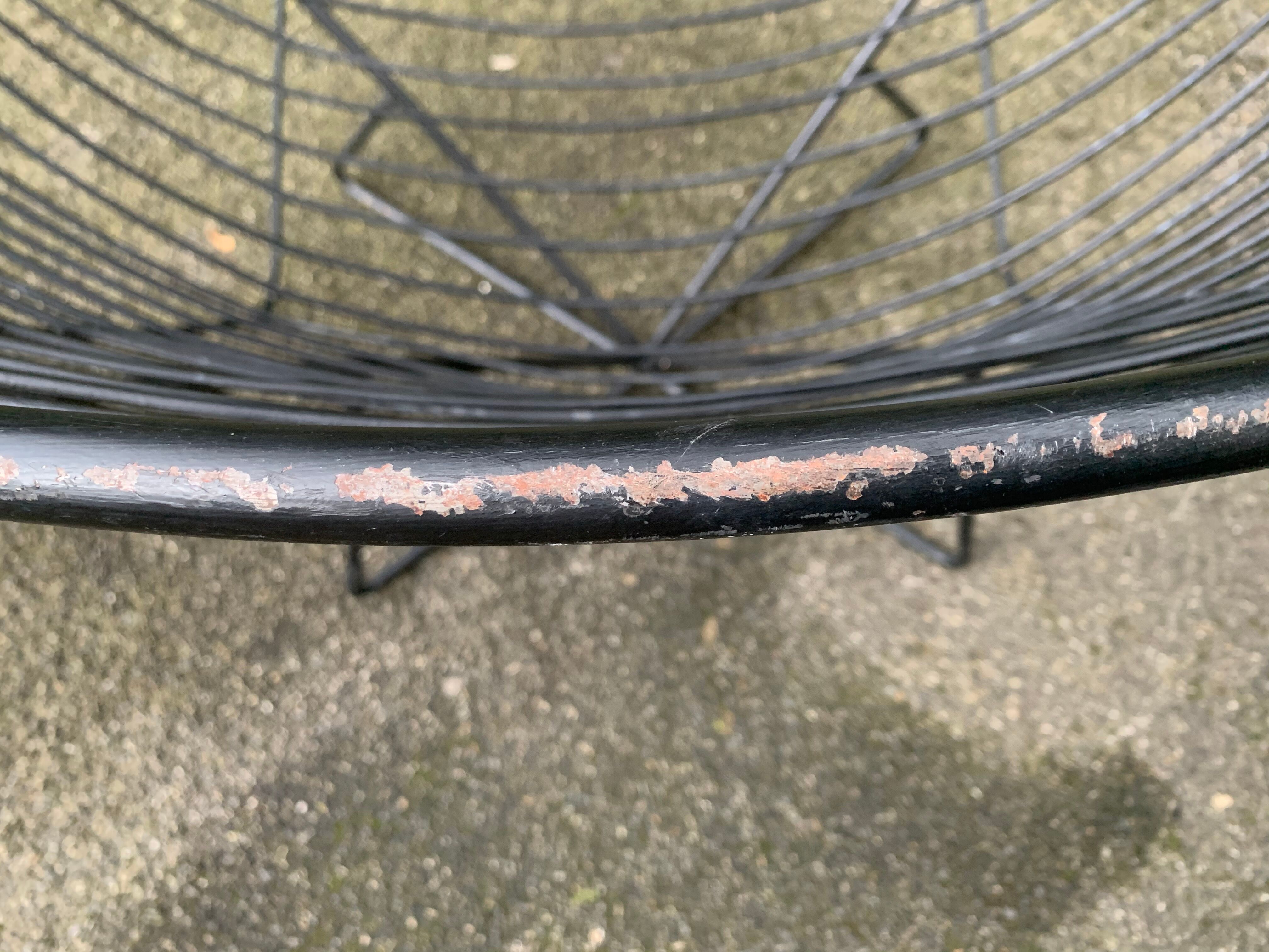 Pair of round chairs in black tubular steel 1960
