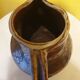 Varnished terracotta pitcher from the 19th century.