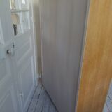 Vintage bookshelf in oak veneer, pearl grey interior, metal legs.