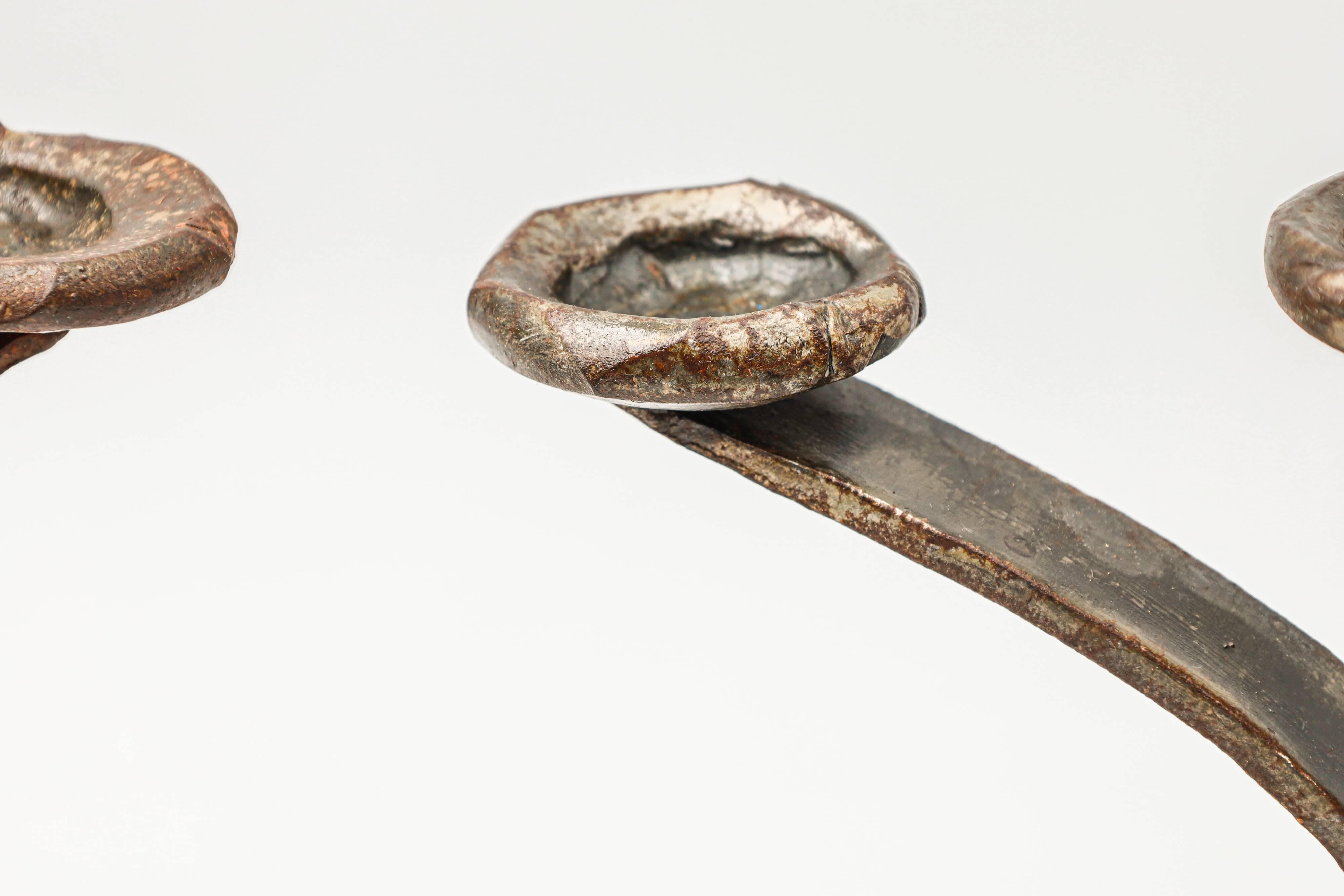 Pair of brutalist wrought iron candlesticks, French work