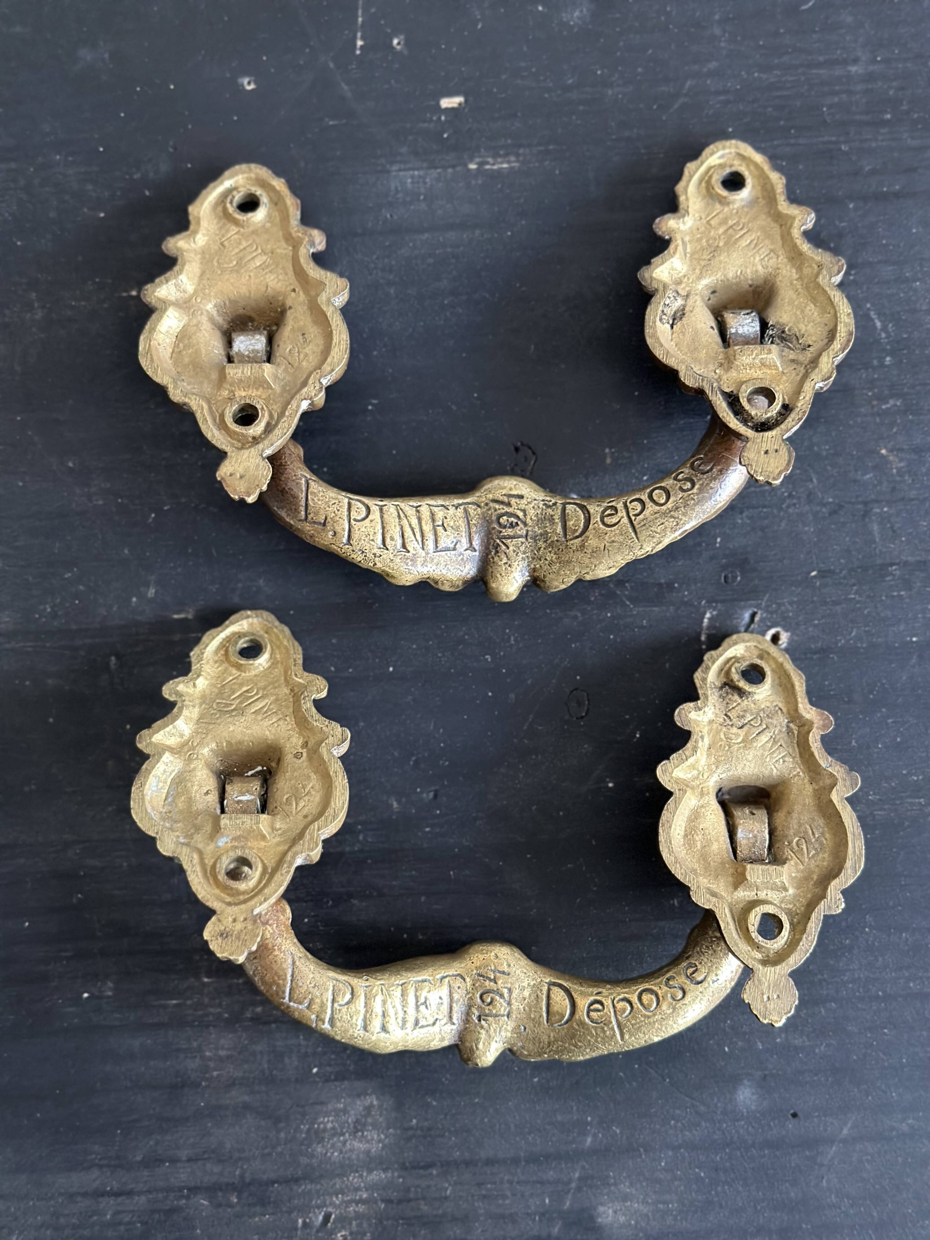 Pair of large antique bronze handles, L. Pinet 19th century