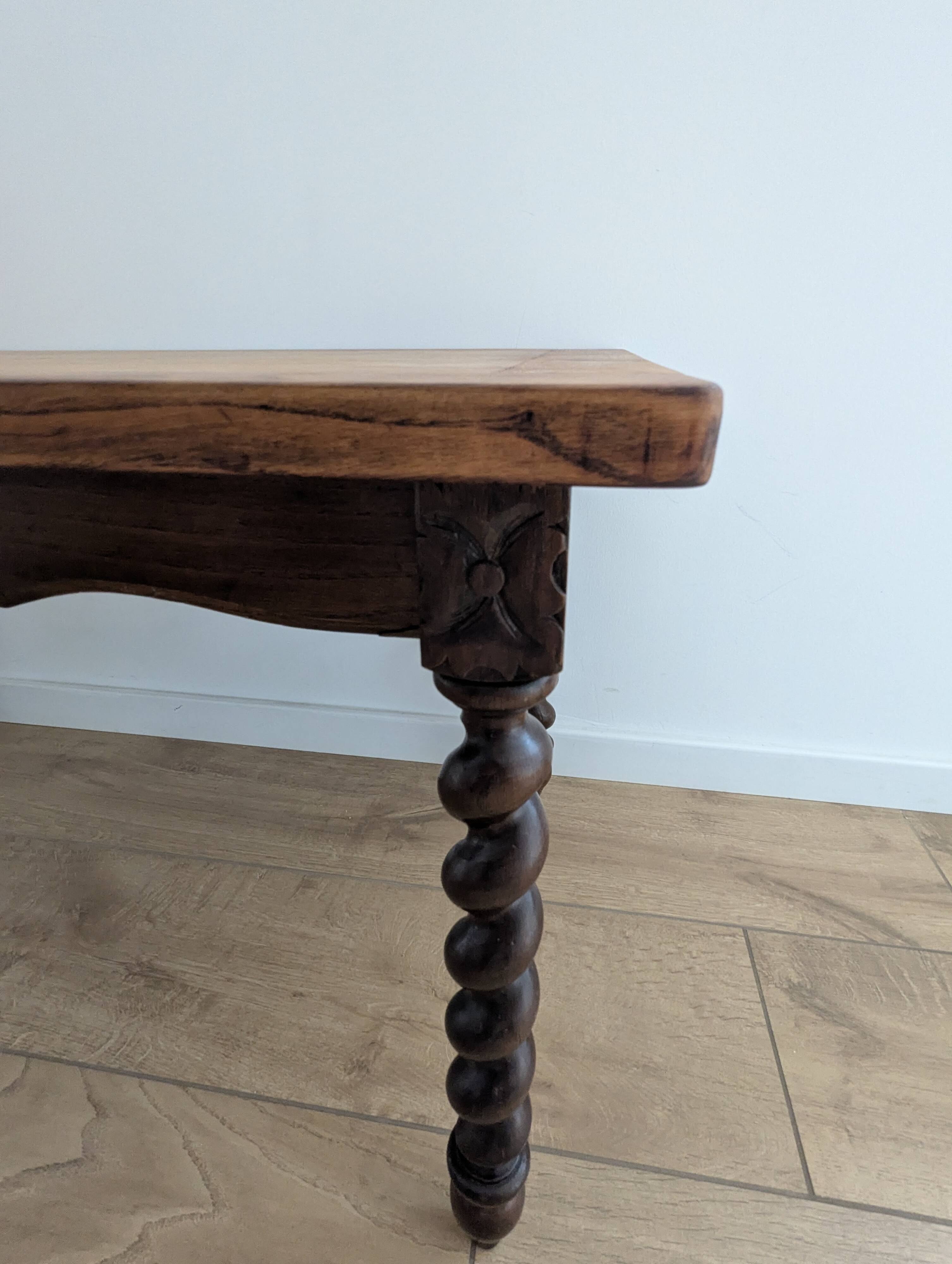 Solid wood coffee table with carved twisted legs